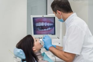 Patient receiving dental exam - Dentist in Swansea, IL