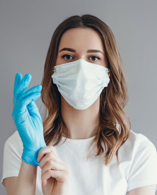 Doctor wearing gloves and mask