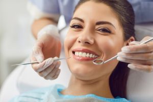 woman smiling in dentist chair