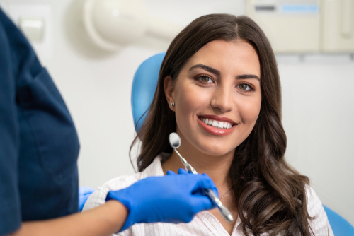 woman smiling in dentist chair