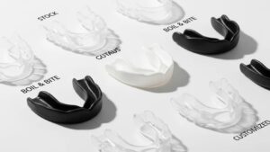 variety-of-mouth-guards-including-stock-boil-and-bite-and-customized-options-on-a-bright-background