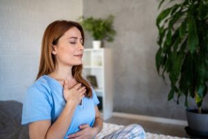 woman doing breathing techniques